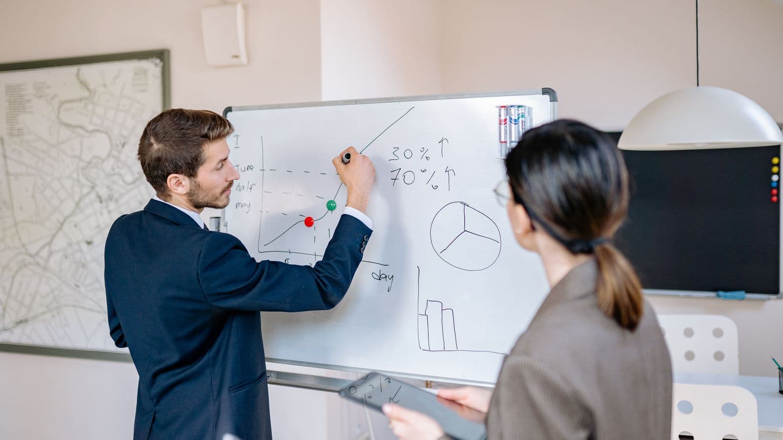 Dynamics 365 Business Central consultants reviewing work together, from the Henley Morgan article Business Central Integration Jobs UK: The SOAP Deadline