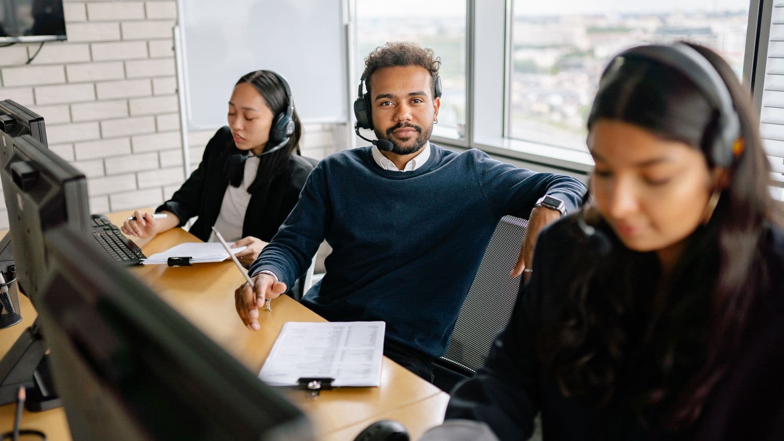 SAP Business One professionals in a workplace meeting, illustrating SAP Business One Jobs UK: Version 11 Hiring Starts Now